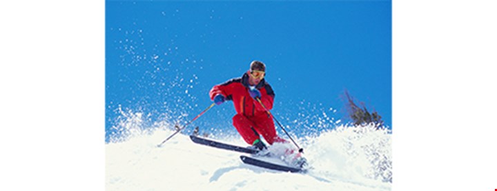 Foto av en som renner på ski